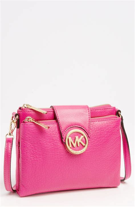 michael kors neon pink bag|Michael Kors pink suitcase.